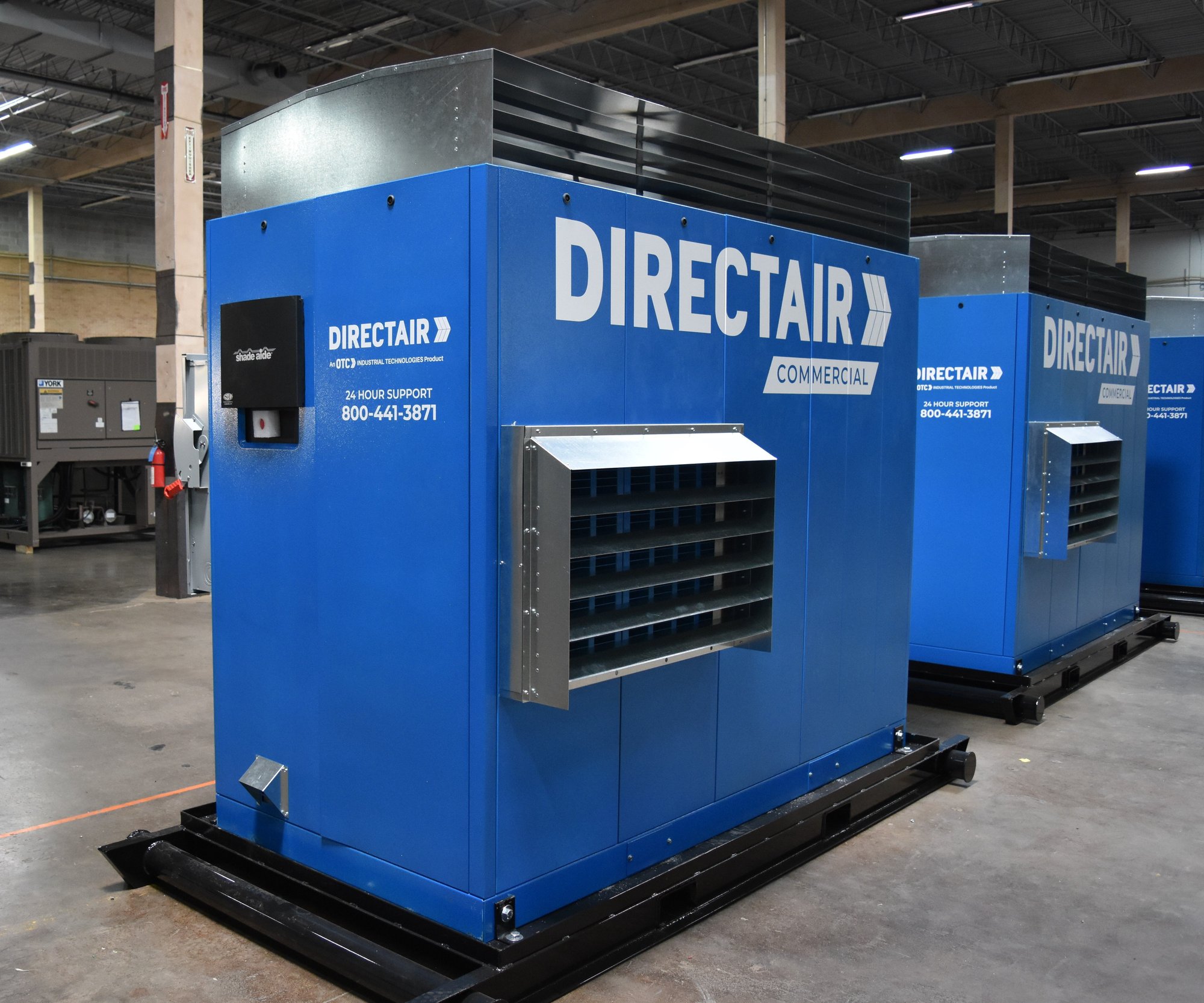 Air compressor module featuring DIRECTAIR Commercial branding in a warehouse
