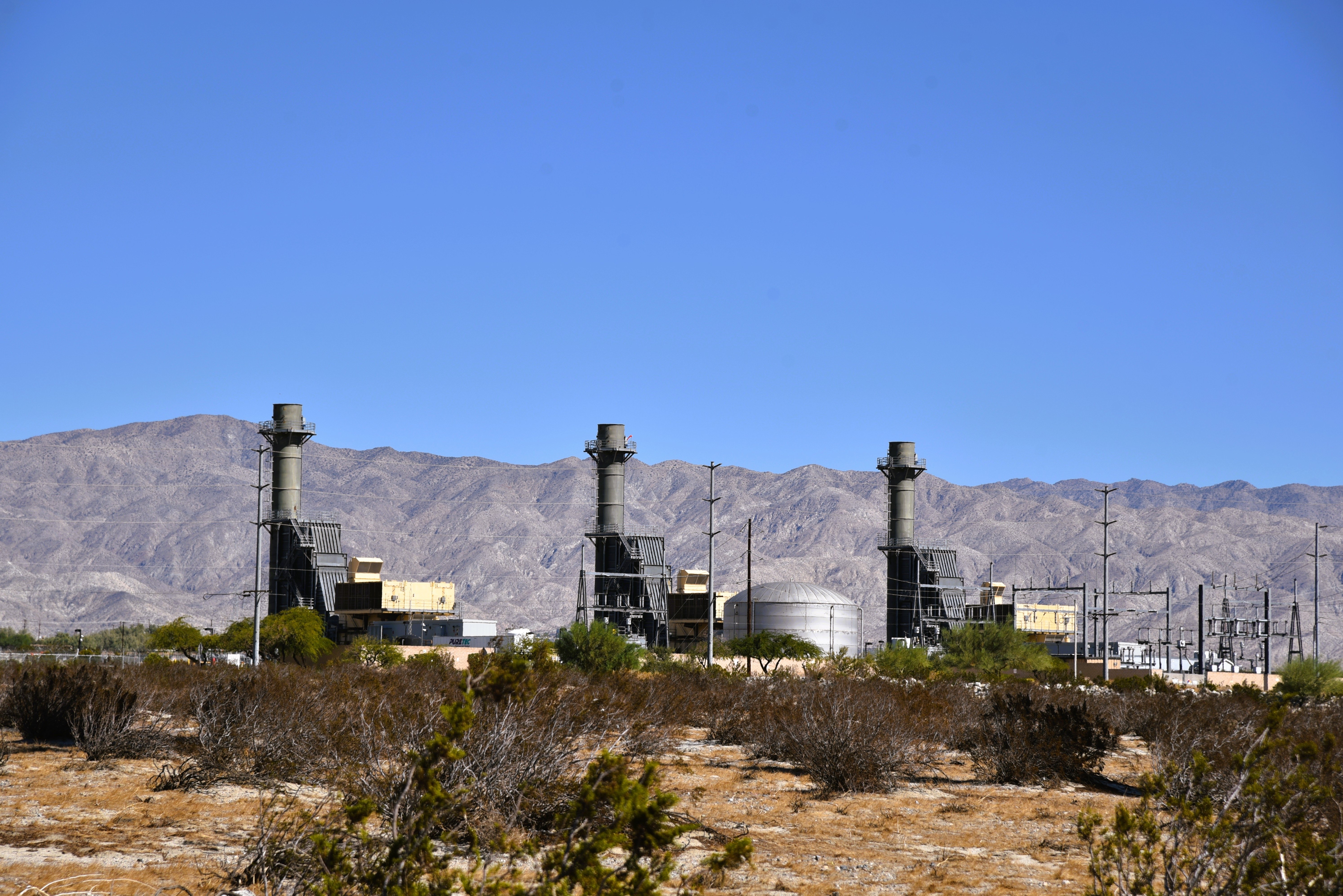 industrial manufacturing facilities in a dry environment with mountains